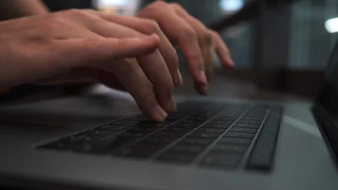 Close up of Female Hands Typing on Keyboard Laptop 4K Stock Footage 112305631