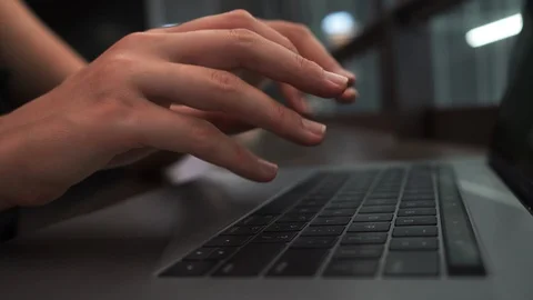 Close up of Female Hands Typing on Keyboard Laptop 4K Stock Footage 112305709