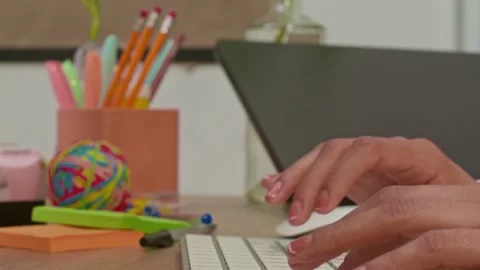 Close-up of Female Hands Typing on Keyboard in Office Stock Footage 339089293