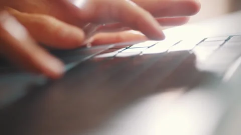 Close-up of female hands typing on laptop keyboard Stock Footage 335621054