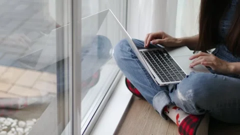 Close-Up Female Hands Typing On Laptop By Window. Stock Footage 340925084