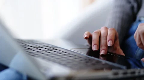 Close up of female hands typing a message or correcting a text on her laptop Stock Footage 61721115