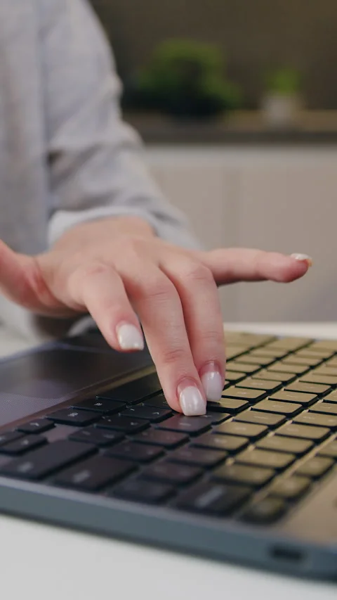 Close up of female hands typing message on laptop. Businesswoman sit at desk tex Stock Footage 333918400