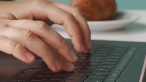 Close up female hands typing on notebook keyboard indoors natural light  Stock Footage 116410230