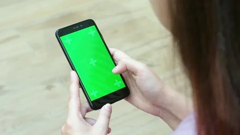 Close-up female hands use a mobile phone Stock Footage 169825894