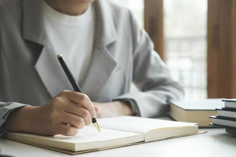 Close up female hands using computer laptop for online working. Stock Photos