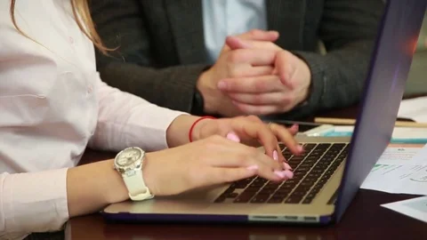 Close-up female hands using laptop Stock Footage 74304667