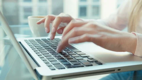Close up of female hands using laptop computer, indoors. Stock Footage
