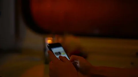 Close-up of female hands using a mobile phone while traveling in the train Stock Footage 69090431