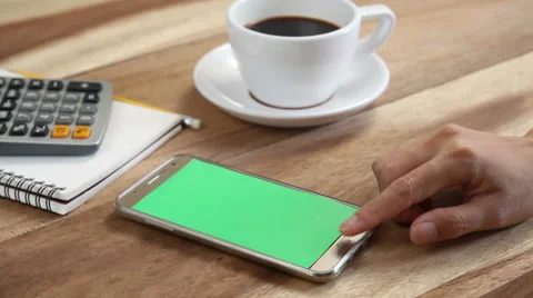 Close-up of female hands using a smart phone. chroma-key, green-screen Stock Footage 62333550