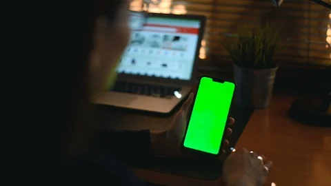 Close-up of female hands using a smart phone. chroma-key, green-screen Stock Footage 98434871