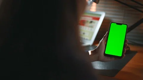 Close-up of female hands using a smart phone. chroma-key, green-screen Stock Footage 98434996