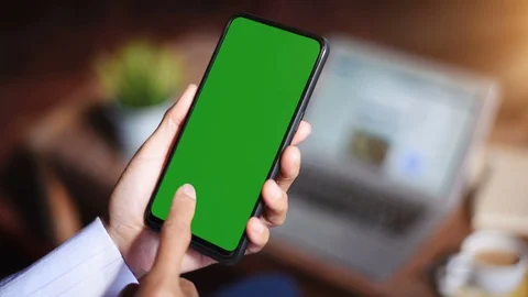 Close-up of female hands using a smart phone. chroma-key, green-screen Stock Footage 101946954