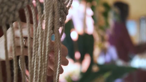 Close-up female hands weaving macrame 動画素材 237707584