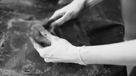Close-up of female hands working with clay. Potter in the process of sculpting Stock Footage 157284010
