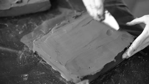 Close-up of female hands working with clay. Potter in the process of sculpting Stock Footage 157284189
