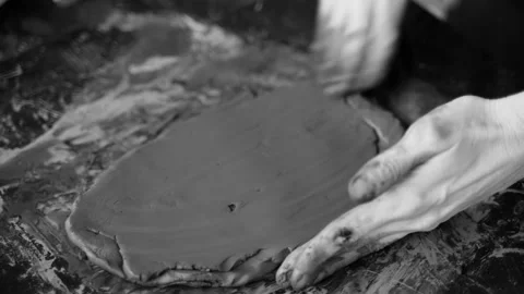 Close-up of female hands working with clay. Potter in the process of sculpting Stock Footage 157284267