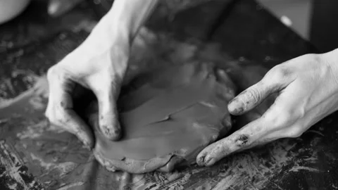Close-up of female hands working with clay. Potter in the process of sculpting Stock Footage 158808942