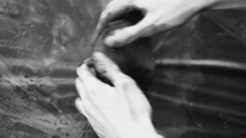 Close-up of female hands working with clay. Potter in the process of sculpting Stock Footage 158928236