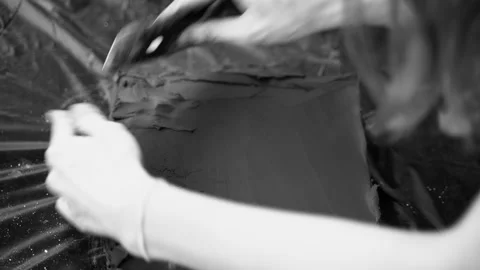 Close-up of female hands working with clay. Potter in the process of sculpting Stock Footage 158928285