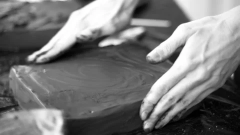 Close-up of female hands working with clay. Potter in the process of sculpting Stock Footage 158928367