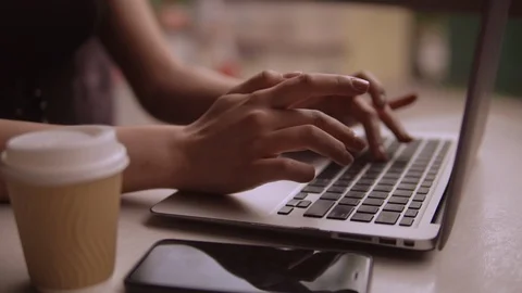 Close up of female hands working on computer Stock Footage 92037441