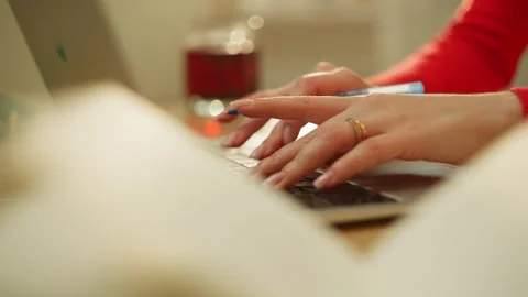 Close-up of female hands working on a computer. Stock Footage 273572575