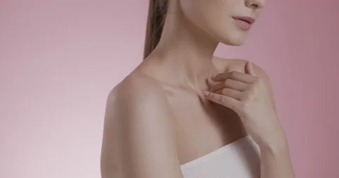 Close up of female model with bare shoulders posing indoors Stock Footage 158756229