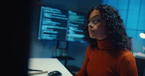 Close-up female programmer typing coding on keyboard working late in office. Vídeos de archivo 347148361