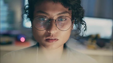 Close-up of female programmer wearing glasses writing software code. Stock Footage 319000770