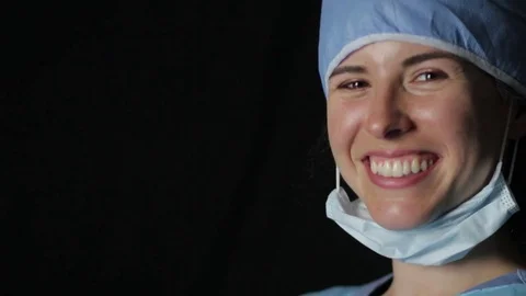 Close up of a female surgeon smiling Stock Footage