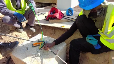 Close up of a female technician using a gas torch tool for electrical wire Stock Footage 342467283