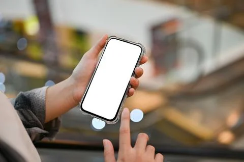 Close-up, A female using her smartphone in the shopping mall. smartphone mock Stock Photos