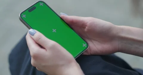 Close Up of a Female Using Smartphone with Green Screen Mock Up Display at Stock-Footage 248611675