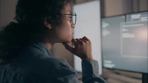 Close-up of female wearing glasses programmer thinking about coding. Stock Footage 319000869