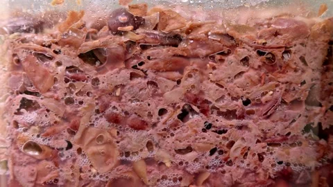Close up of fermentation process of red wine must close up Stock Footage 331558123