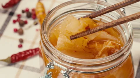 Close-up of fermented spicy cabbage kimchi with in can. Preservation of Video stock 275857421