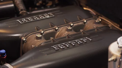 Close up of Ferrari Engine. Ferrari 458 Italia. Camera slowly pushes in Stock Footage 134446517