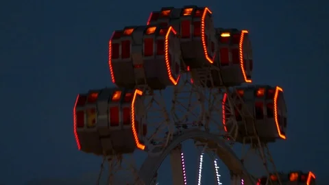 Close-up of Ferris wheel by rotating at night. Stock Footage 75789652