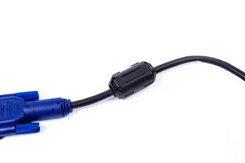 Close up of a ferrite bead inductor on cable on isolated white Stock Photos