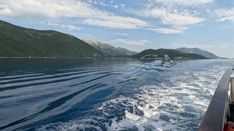 Close Up of Ferry Hull Cutting Through Blue Sea Water in Greece Stock Footage 337006626