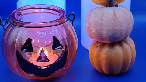 Close-up of festive Halloween decor on a blue background 動画素材 319695744