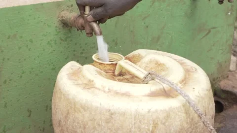 Close up fetching clean water from tap. Stock Footage 320346076