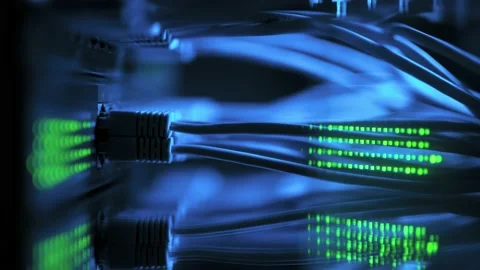 Close up fiber optic in server room. Network cables installed in the rack at Stock Footage 197080430