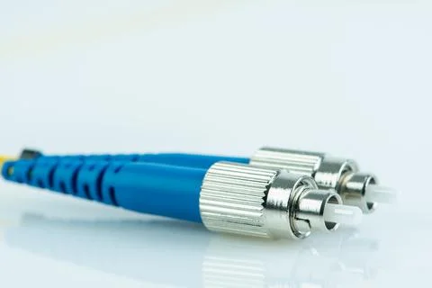 Close-up fiber optic single mode patch cord connector type FC Stock Photos