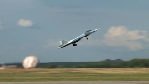 Close-up of fifth-generation fighter Su-57,  taking off almost vertically. Stock Footage 115395041