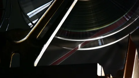 Close up Film Roll is spinning while projecting In the movie theater in 4k or Stock Footage 95703226
