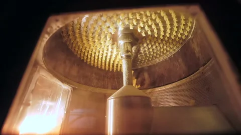 Close filmed in slow motion process of automatic manufacturing spiral pasta Stock Footage 163394345