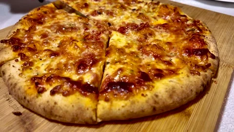 Close up filming of pizza pie slicing into pieces. Shots of Italian food chef Stock Footage 270145661