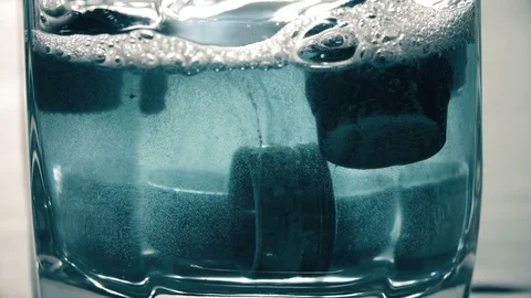 Close up on filter immersed in the liquid to clean it from limestone Stock Footage 80893528